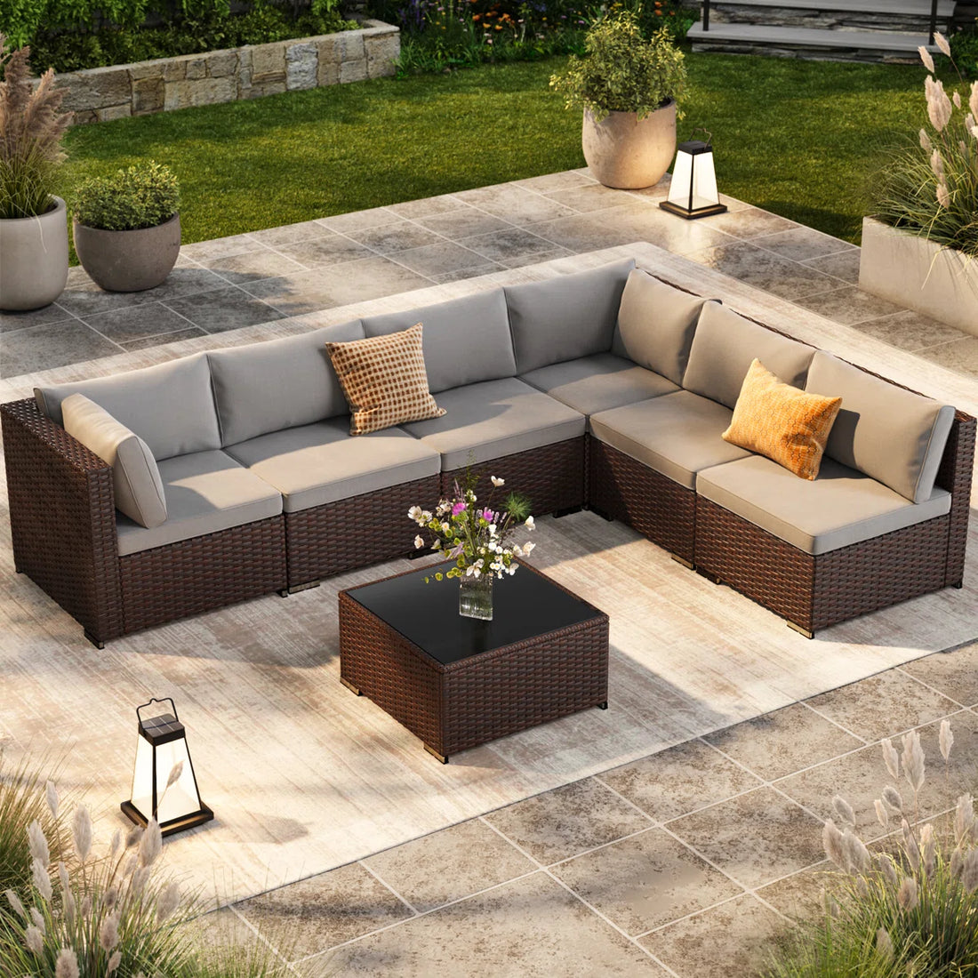 Calvera 7-Piece Rattan Sectional Seating Group with Cushions