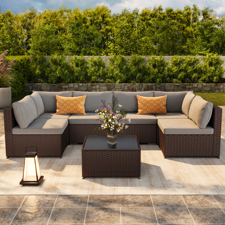 Calvera 7-Piece Rattan Sectional Seating Group with Cushions